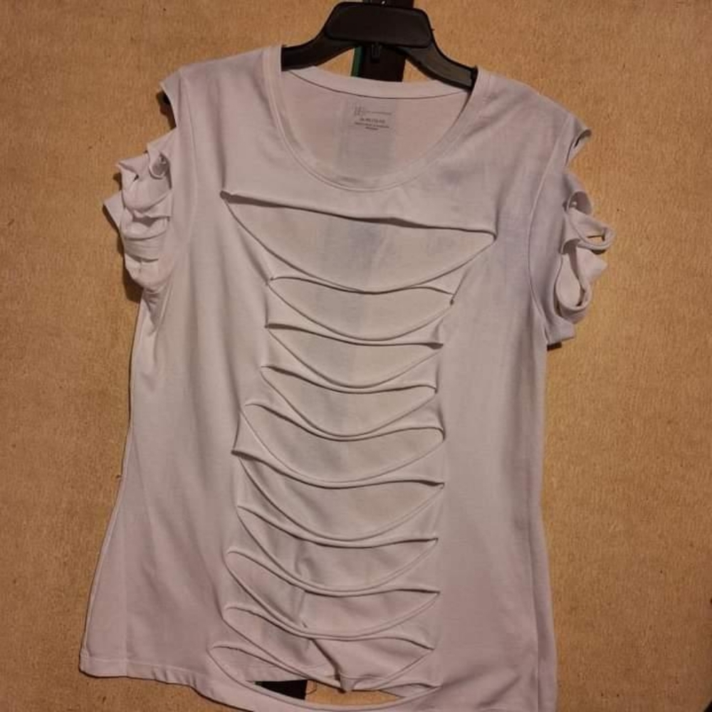 'No Boundaries' white "ripped-for-you" fitted T-shirt.